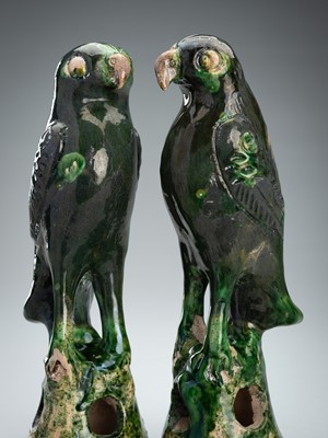 Lot 1881 - A PAIR OF GREEN GLAZED CERAMIC PARROTS, LATE 17TH TO MID-18TH CENTURY