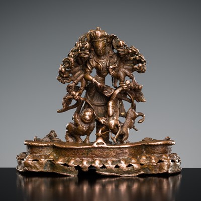 Lot 13 - A FINELY CAST AND PUBLISHED COPPER FIGURE OF DURGA, NEPAL, 15TH-16TH CENTURY