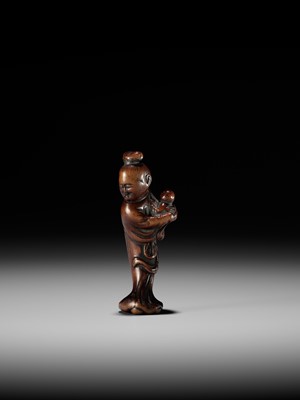 A WOOD NETSUKE OF KAKKYO’S WIFE AND CHILD