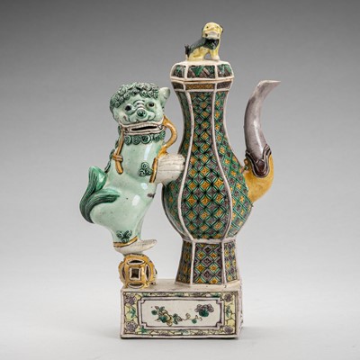 Lot 1931 - A FAMILLE VERTE BISCUIT TEAPOT AND COVER, QING DYNASTY