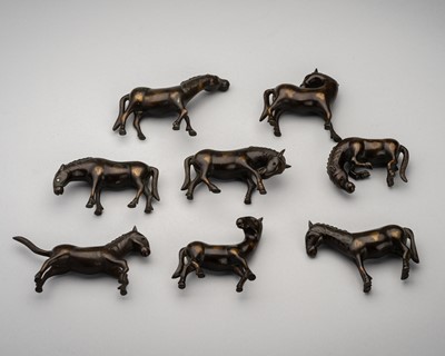 Lot 1586 - A SET OF EIGHT GOLD-SPLASHED BRONZE FIGURES OF HORSES, LATE QING DYNASTY