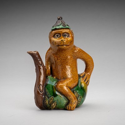 Lot 1721 - A FAMILLE VERTE BISCUIT ‘MONKEY’ TEAPOT, 18TH CENTURY