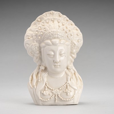 Lot 1755 - A BLANC DE CHINE PORCELAIN BUST OF GUANYIN, c. 1920s