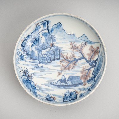 Lot 2019 - A COPPER-RED AND UNDERGLAZE-BLUE PORCELAIN DISH WITH A LANDSCAPE