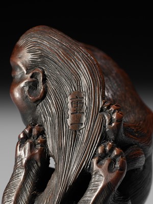 Lot 125 - SHIGEKAZU: A FINE WOOD NETSUKE OF AN