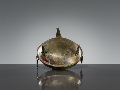 Lot 72 - A BRONZE TRIPOD FOOD VESSEL, DING, HAN DYNASTY