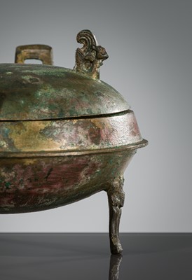 Lot 72 - A BRONZE TRIPOD FOOD VESSEL, DING, HAN DYNASTY