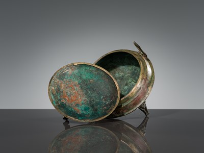 Lot 72 - A BRONZE TRIPOD FOOD VESSEL, DING, HAN DYNASTY