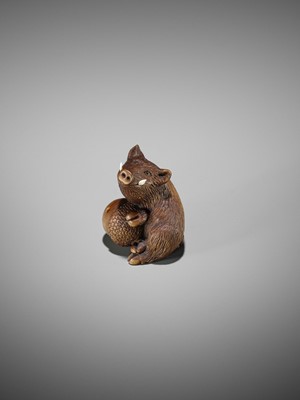 Lot 506 - DERKACHENKO: A WOOD NETSUKE OF A BOAR WITH ACORN