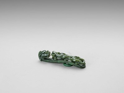 A PAIR OF SPINACH GREEN JADE ‘DRAGON’ BELT HOOKS, LATE QING DYNASTY