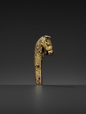 Lot 328 - A GILT BRONZE ‘LONGMA’ HILT, XUANDE PERIOD