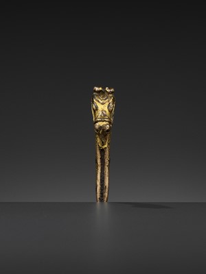 Lot 328 - A GILT BRONZE ‘LONGMA’ HILT, XUANDE PERIOD