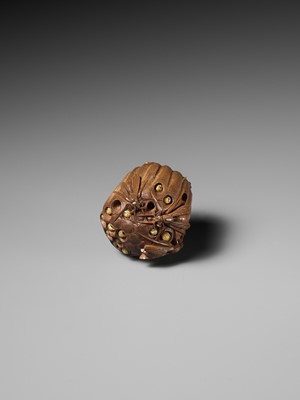 Lot 105 - TADAKAZU: A FINE WOOD NETSUKE OF A WASP NEST WITH MOVABLE LARVAE