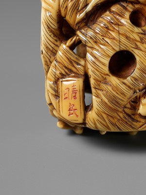 Lot 493 - SEIMIN: A FINE WALRUS TUSK NETSUKE OF TEN FROG MUSICIANS ON A SANDAL