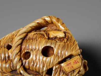 Lot 493 - SEIMIN: A FINE WALRUS TUSK NETSUKE OF TEN FROG MUSICIANS ON A SANDAL