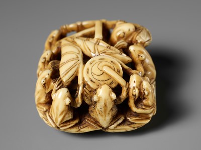 Lot 493 - SEIMIN: A FINE WALRUS TUSK NETSUKE OF TEN FROG MUSICIANS ON A SANDAL