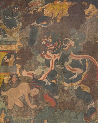 Lot 307 - A VERY LARGE THANGKA OF A WRATHFUL PROTECTOR AND MAHASIDDHAS, TIBET, 18TH-19TH CENTURY