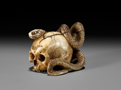 Lot 96 - A FINE IVORY NETSUKE OF A SKULL WITH A SNAKE