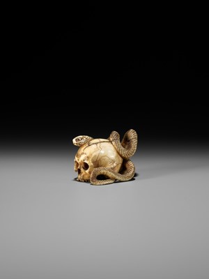 Lot 96 - A FINE IVORY NETSUKE OF A SKULL WITH A SNAKE