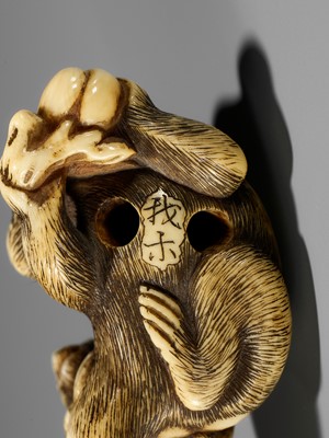 Lot 54 - GARAKU: AN IVORY NETSUKE OF A MONKEY WITH YOUNG