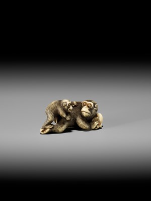 Lot 54 - GARAKU: AN IVORY NETSUKE OF A MONKEY WITH YOUNG