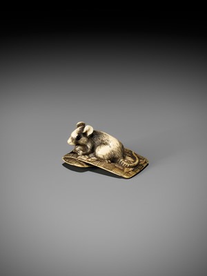 Lot 55 - AN OSAKA SCHOOL IVORY NETSUKE OF A RAT ON A STRAW MAT