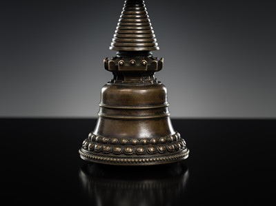 Lot 280 - A BRONZE STUPA, KADAMPA STYLE, TIBET, 13TH CENTURY