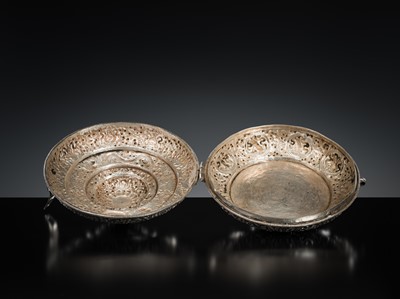 Lot 290 - A TURQUOISE-INLAID SILVER REPOUSSÉ BETEL NUT BOX AND COVER, BHUTAN, EARLY 19TH CENTURY