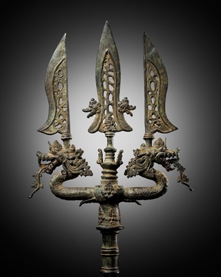 Lot 203 - A LARGE BRONZE TRISULA-FORM HALBERD HEAD WITH NAGA DRAGONS, EAST JAVA, 13TH-14TH CENTURY