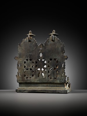 Lot 202 - A RARE BRONZE GROUP DEPICTING SHIVA AND PARVATI WITH NANDI, CENTRAL JAVA, CIRCA 900-950 AD