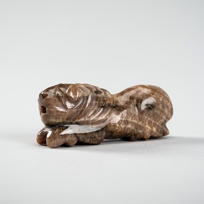 Lot 1109 - A PYU AGATE ‘LION’ TALISMAN, 200-1000 AD