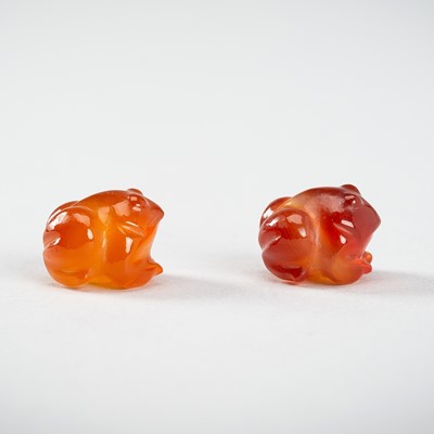 Lot 1104 - A GROUP OF TWO PYU CARNELIAN 'FROG' BEADS, 200-1000 CE