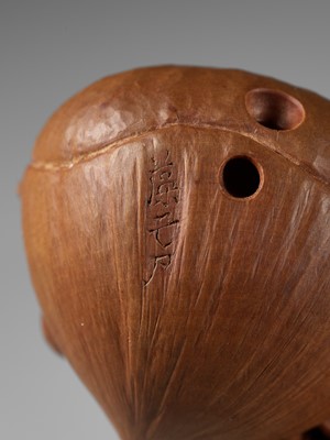 Lot 215 - MORITA SOKO: A FINE NETSUKE OF A SAMURAI CRAB (HEIKEGANI) ON A CHESTNUT