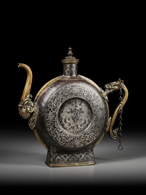 Lot 2 - A SILVER-DAMASCENED IRON BEER JUG WITH BRASS HANDLE AND SPOUT, 18TH-19TH CENTURY