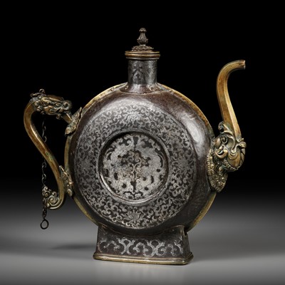 A SILVER-DAMASCENED IRON BEER JUG WITH BRASS HANDLE AND SPOUT, 18TH-19TH CENTURY