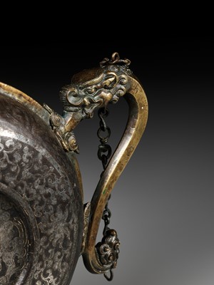 Lot 2 - A SILVER-DAMASCENED IRON BEER JUG WITH BRASS HANDLE AND SPOUT, 18TH-19TH CENTURY