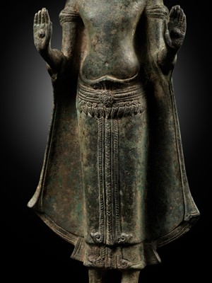 Lot 599 - A BRONZE FIGURE OF CROWNED BUDDHA, ANGKOR PERIOD