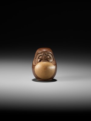Lot 278 - SUKEYUKI: A RARE HIDA SCHOOL ITTOBORI YEW WOOD NETSUKE OF A DARUMA DOLL