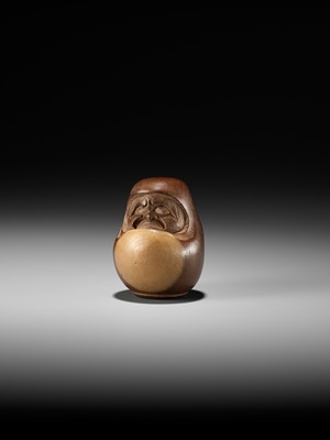 Lot 278 - SUKEYUKI: A RARE HIDA SCHOOL ITTOBORI YEW WOOD NETSUKE OF A DARUMA DOLL