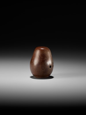 Lot 278 - SUKEYUKI: A RARE HIDA SCHOOL ITTOBORI YEW WOOD NETSUKE OF A DARUMA DOLL