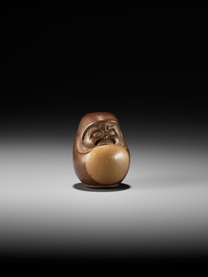 Lot 278 - SUKEYUKI: A RARE HIDA SCHOOL ITTOBORI YEW WOOD NETSUKE OF A DARUMA DOLL