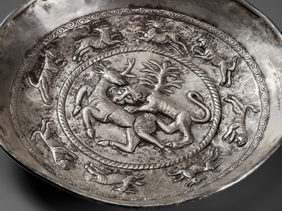Lot 322 - A SILVER REPOUSSÉ ‘HUNTING’ PLATE, CENTRAL ASIA, 1ST MILLENNIUM AD