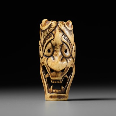 Lot 517 - AN ANTLER MASK NETSUKE OF HANNYA