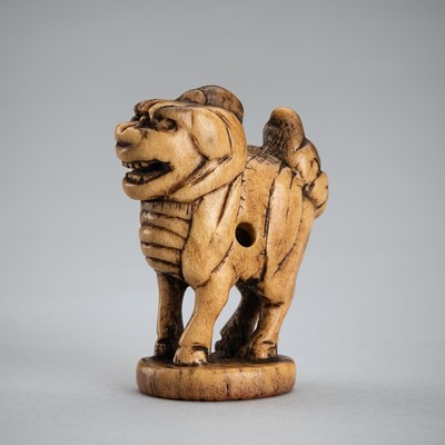 Lot 628 - A STAG ANTLER SEAL NETSUKE OF A KIRIN