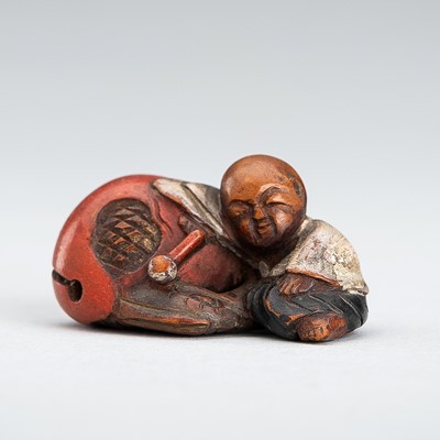 A LACQUERED WOOD NETSUKE OF A MONK WITH BELL, EDO PERIOD