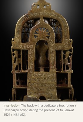 Lot 254 - A JAIN SILVER AND COPPER-INLAID BRASS SHRINE TO SAMBHAVANATHA, DATED 1464