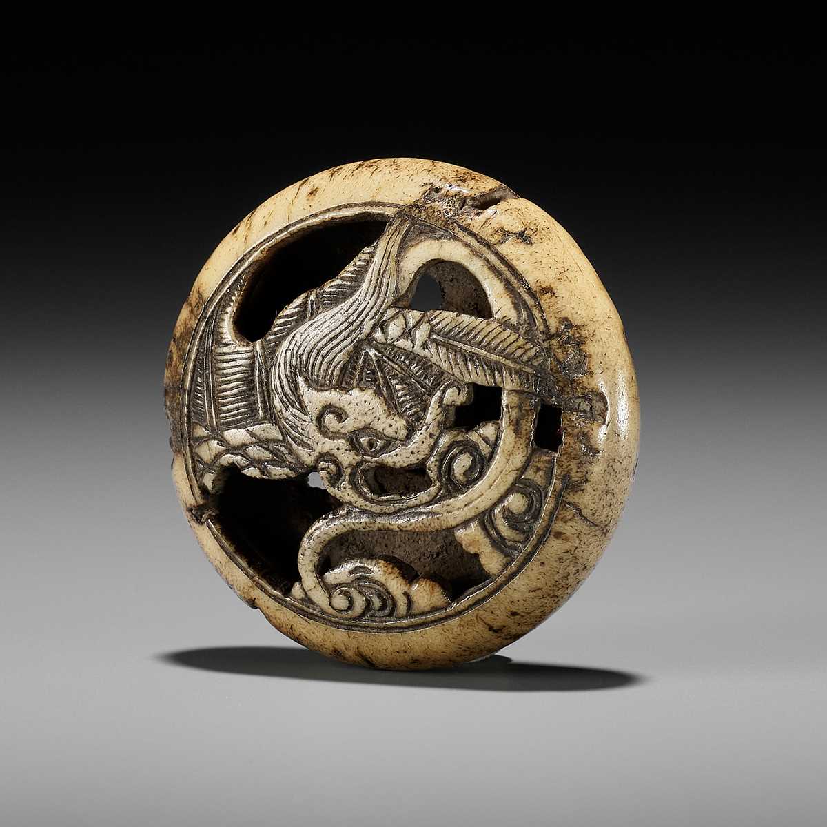 Lot 265 - AN ANTLER RYUSA MANJU NETSUKE OF A RAIN