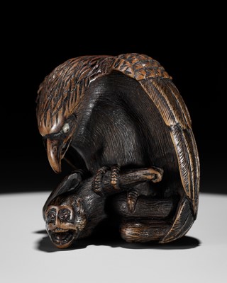 Lot 142 - NOBUKAZU: A FINE WOOD NETSUKE OF AN EAGLE ATTACKING A MONKEY