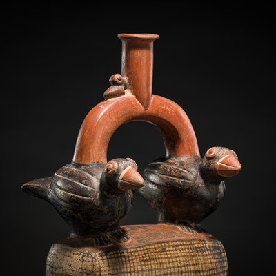 Lot 133 - A CERAMIC STIRRUP-SPOUT VESSEL DEPICTING TWO BIRDS ATOP A BALE, MOCHE CULTURE