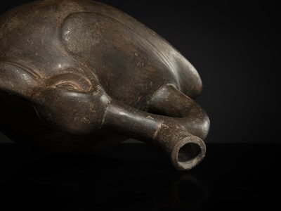 Lot 129 - A CERAMIC STIRRUP-SPOUT VESSEL IN THE FORM OF A DUCK, MOCHE CULTURE